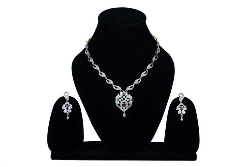 Diamond ring on white velvet - studio jewelry photoshoot